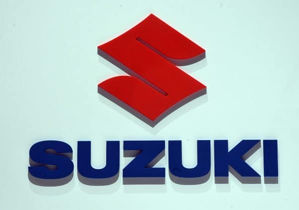 07 March 2018, Switzerland, Geneva: The logo of carmaker Suzuki is displayed  during the 2nd Press Day at the 2018 Geneva Motor Show. The  Geneva Motor Show runs from 8 March to 18 March 2018. Photo: Uli Deck/dpa