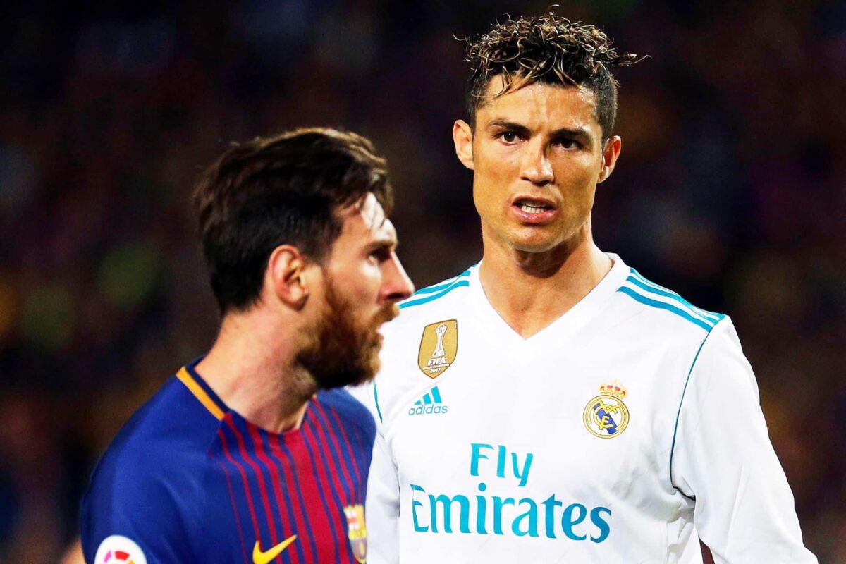 epa06715822 FC Barcelona's striker Lionel Messi (L) and Real Madrid's striker Cristiano Ronaldo (R) react during the Spanish Primera Division soccer match between FC Barcelona and Real Madrid at Camp Nou in Barcelona, Spain, 06 May 2018.  EPA/ALEJANDRO GARCIA