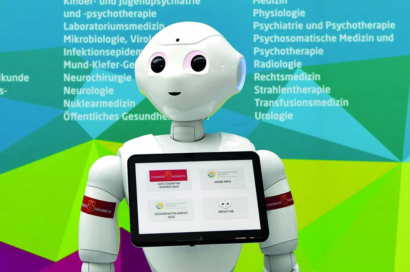 28 November 2018, Lower Saxony, Hannover: The humanoid robot "Lou" stands in front of a poster at the beginning of a press conference during the Digital Summit on Health. Among other things, the conference will deal with the future of telemedical treatment models. (to dpa "helper or scaremonger? - "Dr. Google" competes with doctors" from 28.11.2018) Photo by: Holger Hollemann/picture-alliance/dpa/AP Images