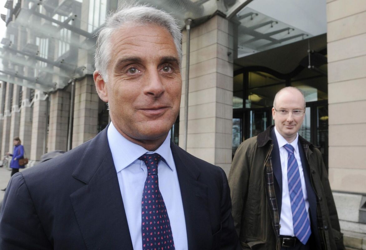 epa03528729 Andrea Orcel (L) the head of the UBS investment bank, and Andrew Williams (R) Global head of Compliance leave Portcullis House after giving evidence to the UK Parliamentary banking inquiry on Libor interest rates in London, Britain, 09 January 2013.  EPA/FACUNDO ARRIZABALAGA