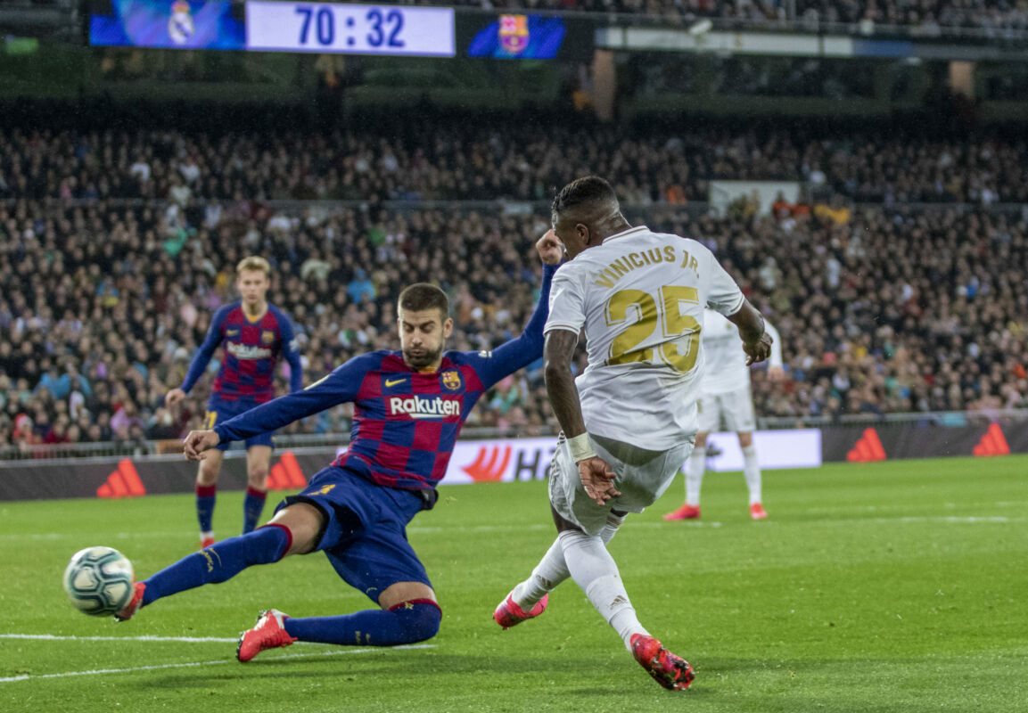 March 1, 2020, Madrid, Spain: Vinicius Jr of Real (R) in action during the Spanish La Liga match round 26 between Real Madrid and FC Barcelona at Santiago Bernabeu Stadium in Madrid..Final score: Real Madrid 2-0 Barcelona. (Credit Image: © Manu Reino/SOPA Images via ZUMA Wire)