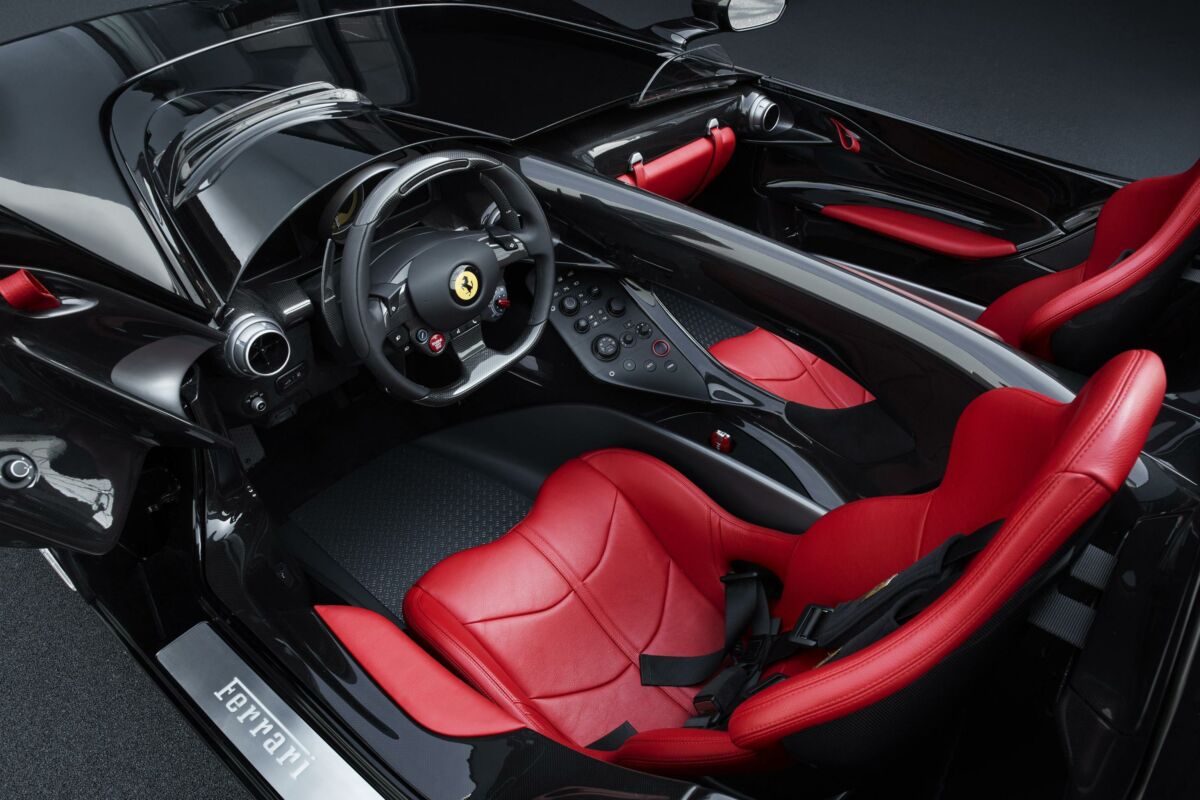 epa07030506 A handout photo made available by Ferrari Press Office shows the interior of the new supercar Ferrari SP2 displayed in Maranello, Italy, 18 September 2018. Ferrari will launch 15 new models between 2019 and 2020 and then its eagerly anticipated Purosangue (Thoroughbred) SUV in 2022, the Italian glamour sportscar maker said on 18 September.  EPA/FERRARI PRESS OFFICE / HANDOUT  HANDOUT EDITORIAL USE ONLY/NO SALES