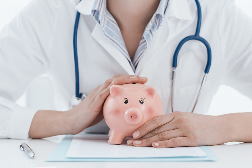 Female,Doctor,And,Piggy,Bank:,Health,Insurance,,Medical,Expenses,And