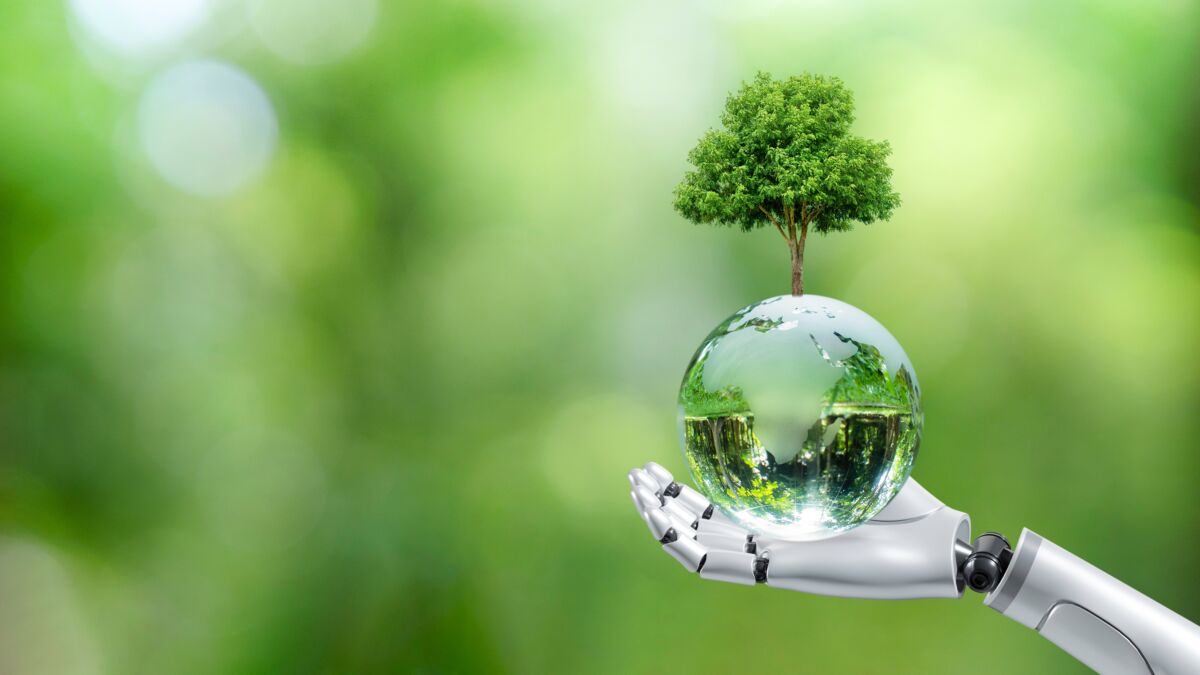 Earth,Crystal,Glass,Globe,Ball,And,Tree,In,Robot,Hand
