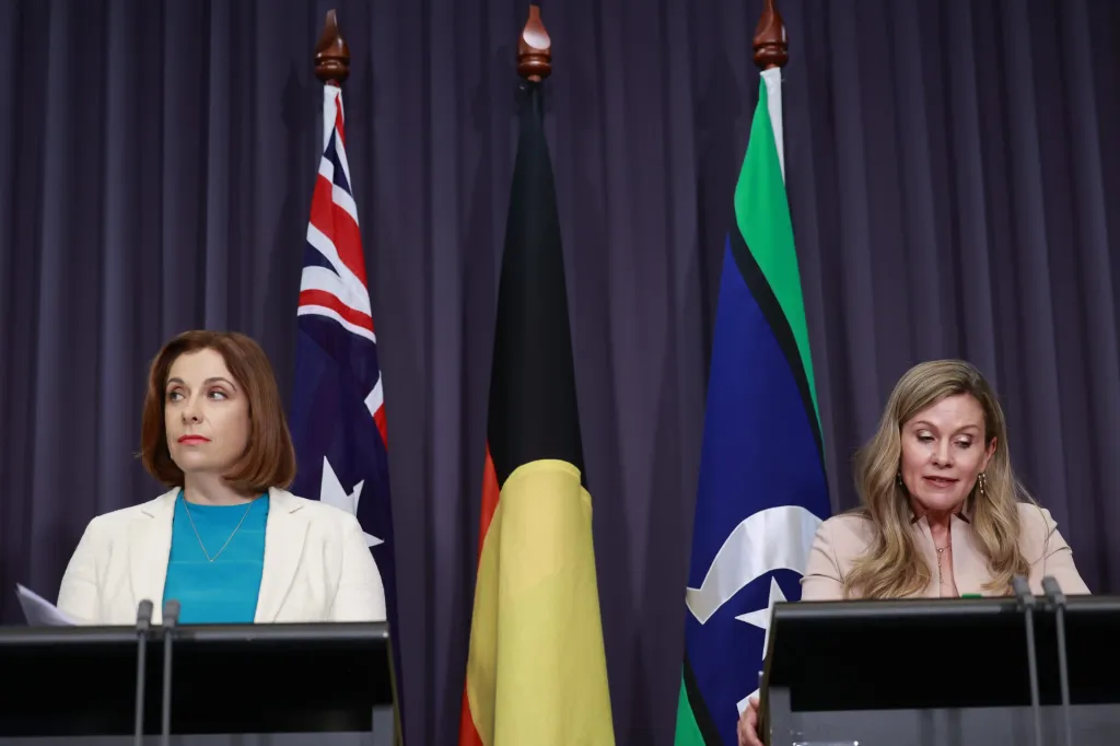 Minister for Sport and Communications Anika Wells (left) and E-Safety Commissioner Julie Inman Grant at Parliament House, Nov. 5, 2025, in Canberra, Australia.Hilary Wardhaugh—Getty Images Australia