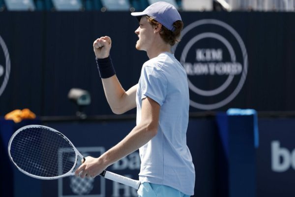 epa09112467 Jannik Sinner of Italy celebrates match point against Roberto Bautista Agut of Spain during their semi-final Men's singles match at the Miami Open tennis tournament in Miami Gardens, Florida, USA, 02 April 2021.  EPA/RHONA WISE