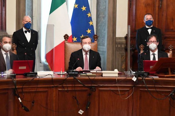 epa09009240 Italian Foreign Minister Luigi Di Maio (L), new Prime Minister Mario Draghi (C) and Undersecretary of State at the Presidency of the Council of Ministers, Roberto Garofoli (R), attend the first council of Ministers at Chigi Palace in Rome, Italy, 13 February 2021. Former European Central Bank (ECB) chief Mario Draghi has been sworn in on the day as Italy's prime minister after he put together a government securing broad support across political parties following the previous coalition's collapse.  EPA/ETTORE FERRARI / POOL