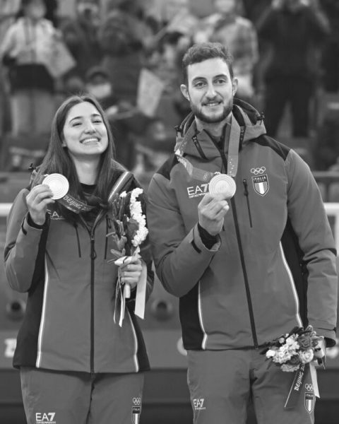 (220208) -- BEIJING, Feb. 8, 2022 (Xinhua) -- Gold medalists Stefania Constantini (L) and Amos Mosaner of Italy attend the awarding ceremony of the curling mixed doubles event of the Beijing 2022 Winter Olympics at the National Aquatics Centre in Beijing, capital of China, Feb. 8, 2022. (Xinhua/Li He)