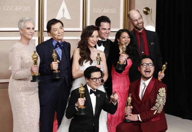 epa10519396 (L-R) Jamie Lee Curtis with her Oscar for Best Supporting Actress, James Hong, Michelle Yeoh with her Oscar for Best Actress, Jonathan Wang with his Oscar for Best Picture, Stephanie Hsu, Daniel Scheinert with his Oscar for Best Director and in the front row and Ke Huy Quan with his Oscar for Best Supporting Actor and Daniel Kwan with his Oscar for Best Director all for 'Everything Everywhere All at Once' in the press room during the 95th annual Academy Awards ceremony at the Dolby Theatre in Hollywood, Los Angeles, California, USA, 12 March 2023. The Oscars are presented for outstanding individual or collective efforts in filmmaking in 24 categories.  EPA/CAROLINE BREHMAN