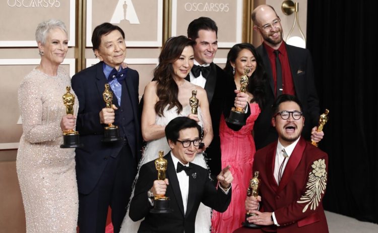 epa10519396 (L-R) Jamie Lee Curtis with her Oscar for Best Supporting Actress, James Hong, Michelle Yeoh with her Oscar for Best Actress, Jonathan Wang with his Oscar for Best Picture, Stephanie Hsu, Daniel Scheinert with his Oscar for Best Director and in the front row and Ke Huy Quan with his Oscar for Best Supporting Actor and Daniel Kwan with his Oscar for Best Director all for 'Everything Everywhere All at Once' in the press room during the 95th annual Academy Awards ceremony at the Dolby Theatre in Hollywood, Los Angeles, California, USA, 12 March 2023. The Oscars are presented for outstanding individual or collective efforts in filmmaking in 24 categories.  EPA/CAROLINE BREHMAN