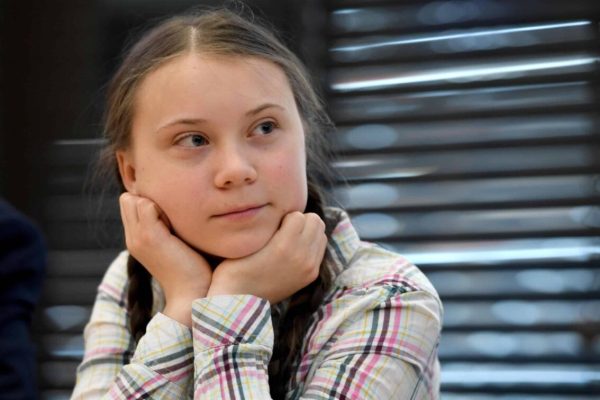 epa07523539 Swedish schoolgirl climate activist Greta Thunberg during an event inside the Houses of Parliament in Westminster, London, Britain, 23 April 2019. Greta Thunberg, was joined by Green Leader Caroline Lucas, Former Labour leader, Ed Miliband and Secretary of State for the Environment, Michael Gove. Her visit coincides with the ongoing 'Extinction Rebellion' protests across London aimed to highlight the dangers of climate change.  EPA/FACUNDO ARRIZABALAGA