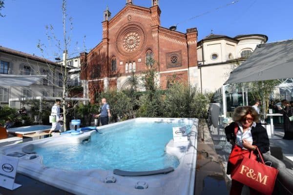 A woman walks past a Jacuzzi tub part of the Fuori Salone Design Week in Milan, Italy, 17 April 2018.The fair, running from 17 to 22 April, is considered the largest of its kind in the world, and presents the latest trends and designs on furniture, lighting and home accessories. ANSA/DANIEL DAL ZENNARO