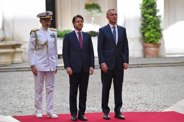Italian Prime Minister Giuseppe Conte (C) welcomes Nato Secretary General Jens Stoltenberg (R) at Chigi Palace in Rome, Italy, 11 June 2018.    ANSA/ETTORE FERRARI