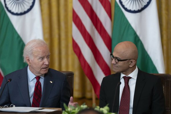 United States President Joe Biden looks toward Satya Nadella, CEO, Microsoft during a meeting with Prime Minister Narendra Modi of the Republic of India and senior officials and CEOs of American and Indian companies gathered to discuss innovation, investment, and manufacturing in a variety of technology sectors, including AI, semiconductors, and space at the White House in Washington, DC, June 23, 2023. Credit: Chris Kleponis / Pool via CNP