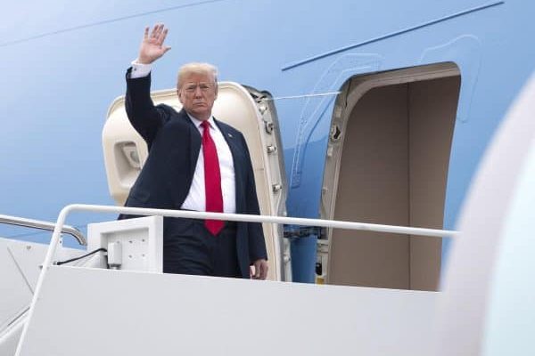 epa06775566 President Donald Trump waves as he boards Air Force Once as he departs for a day trip to Texas, at Joint Base Andrews, Maryland, USA, 31 May 2018.  EPA/KEVIN DIETSCH / POOL