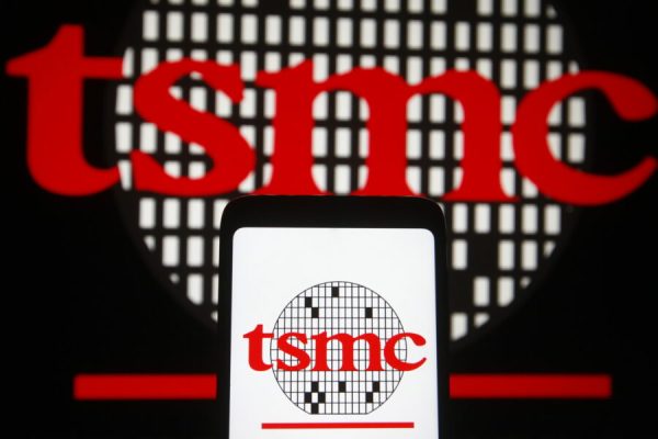 February 23, 2021, Ukraine: In this photo illustration, TSMC (Taiwan Semiconductor Manufacturing Company) logo seen displayed on a smartphone and pc screen. (Credit Image: © Pavlo Gonchar/SOPA Images via ZUMA Wire)