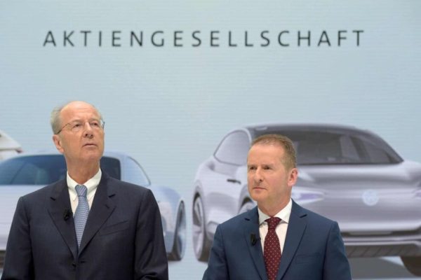 epa06665943 Volkswagen Chairman of the Supervisory Board Hans Dieter Poetsch (L) and new Volkswagen CEO Herbert Diess (R) attend a press conference after a Supervisory Board Meeting of the Volkswagen Group in Wolfsburg, Germany, 13 April 2018. The Board of Management and Supervisory Board of Volkswagen decided on 12 April 2018 to change their management structure including the replacement of the Chairman of the Groupâs Board of Management.  EPA/JENS SCHLUETER