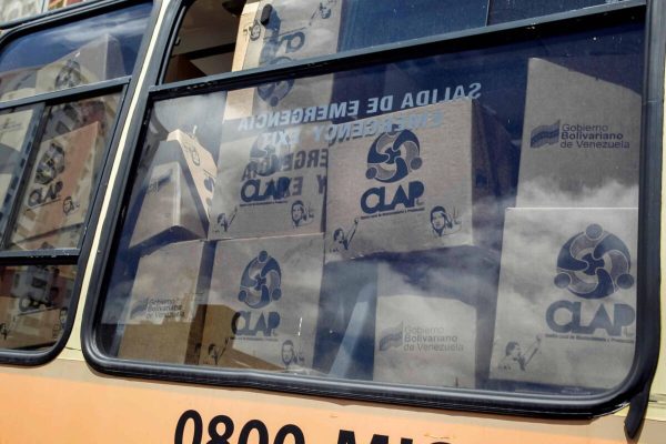 epa07399664 View of a vehicle full of boxes of the Local Committee for Supply and Production (CLAP), in Caracas, Venezuela, 26 February 2019.  EPA/Raul Martínez