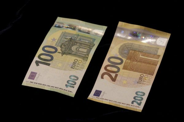 epa07596702 A view of new euro banknotes in Riga, Latvia, 24 May 2019. Latvia will be launching new 100 euro and 200 euro banknotes On 28th May 2019. These are the latest European series of banknotes with refurbished design and advanced security features.  EPA/Toms Kalnins
