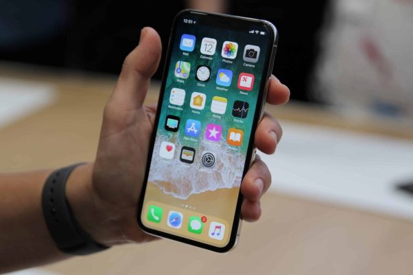 Apple presents the new iPhone X at the Steve Jobs Theatre in the Apple Park, the new company's headquarter of the iPhone manufacturer in Cupertino, US, 12 September 2017. The new top model does not have the ordinary Home-Button and unlocks the phone via facial recognition (Face ID) instead of a fingerprint sensor. The device will be launched on the German market on 03 November and will cost from 1,149 euros.· NO WIRE SERVICE · Photo: Christoph Dernbach/dpa