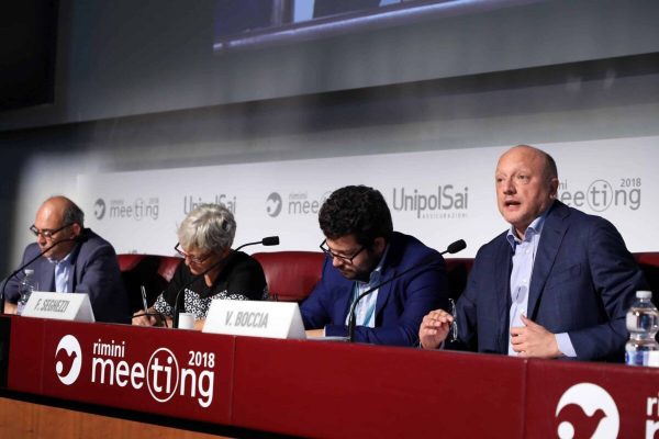 Vincenzo Boccia, presidente di Confindustria, Guido Luigi Canavesi, Professore di Diritto del lavoro all'Università di Macerata, Annamaria Furlan, segretaria generale della Cisl, e Francesco Seghezzi, direttore della Fondazione Adapt, al Meeting di Rimini, 24 agosto 2018. ANSA/ PASQUALE BOVE