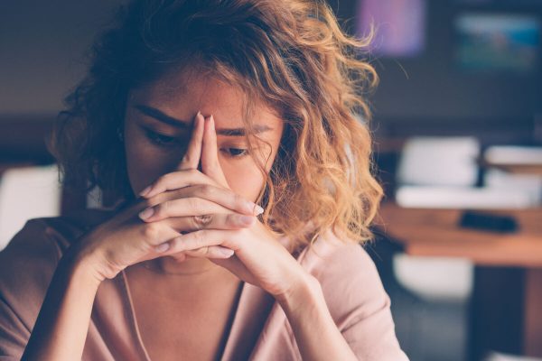 Closeup,Of,Sad,Young,Asian,Woman,At,Cafe,Leaning,Head