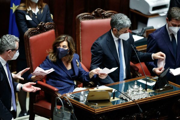 epa09710713 Maria Elisabetta Alberti Casellati and Roberto Fico during the vote at the Chamber of deputies, in Rome, Italy, 26 January 2022. Lawmakers from both houses of parliament and regional representatives on 26 January hold a third round of voting, where two-thirds majority is needed to select Italian president, after the first two rounds of voting proved inconclusive.  EPA/ROBERTO MONALDO / POOL