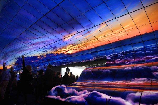 LAS VEGAS, Jan. 9, 2019  Visitors watch a giant curved display of LG during the Consumer Electronics Show (CES) in Las Vegas, the United States, on Jan. 8, 2019. 2019 CES highlights new displays from global companies, such as LG, Samsung and Sharp. CES, the world's largest trade show to present new products and technologies in the consumer electronics industry, runs till Friday, attracting about 4,500 exhibitors and 180,000 attendees in 2019. (Credit Image: © Liu Jie/Xinhua via ZUMA Wire)