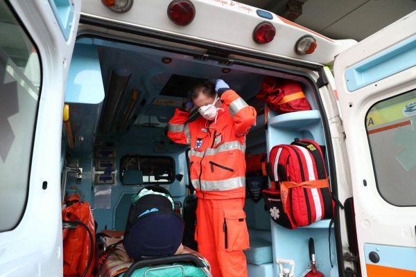 Nurses wearing protective masks against Coronavirus aboard an ambulance from the hospital's emergency room ''Poliambulanza of Brescia'', Brescia, Italy, 24 February 2020.  ANSA / Filippo Venezia