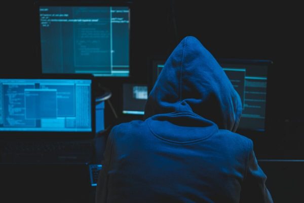 Hacker,Using,Computer,For,Organizing,Massive,Data,Breach,Attack,On
