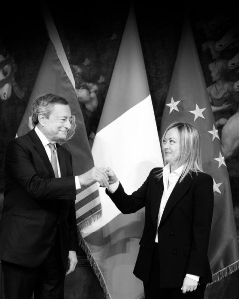 This handout picture, provided by Chigi Palace Press Office, shows Italy's outgoing Prime Minister Mario Draghi (L) hands over the bell used by the cabinet President to manage cabinet debates to Prime Minister, Giorgia Meloni (R), during the handover ceremony at Chigi Palace in Rome, Italy, 23 October 2022. Newly elected Prime Minister, Giorgia Meloni, and her cabinet were sworn in on 22 October.    NPK     ANSA / Filippo Attili - Chigi Palace Press Office handout   +++ ANSA PROVIDES ACCESS TO THIS HANDOUT PHOTO TO BE USED SOLELY TO ILLUSTRATE NEWS REPORTING OR COMMENTARY ON THE FACTS OR EVENTS DEPICTED IN THIS IMAGE; NO ARCHIVING; NO LICENSING +++