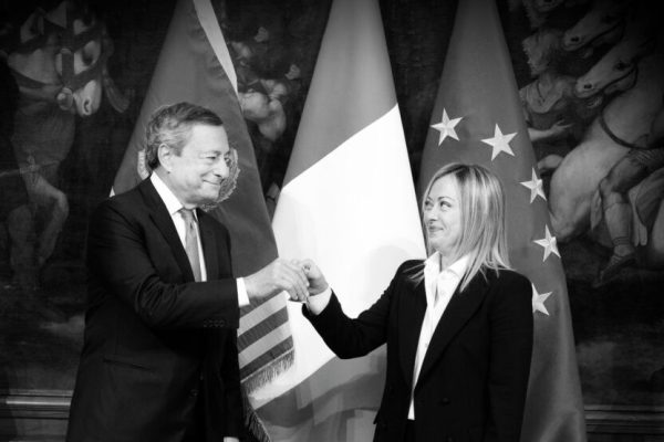 This handout picture, provided by Chigi Palace Press Office, shows Italy's outgoing Prime Minister Mario Draghi (L) hands over the bell used by the cabinet President to manage cabinet debates to Prime Minister, Giorgia Meloni (R), during the handover ceremony at Chigi Palace in Rome, Italy, 23 October 2022. Newly elected Prime Minister, Giorgia Meloni, and her cabinet were sworn in on 22 October.    NPK     ANSA / Filippo Attili - Chigi Palace Press Office handout   +++ ANSA PROVIDES ACCESS TO THIS HANDOUT PHOTO TO BE USED SOLELY TO ILLUSTRATE NEWS REPORTING OR COMMENTARY ON THE FACTS OR EVENTS DEPICTED IN THIS IMAGE; NO ARCHIVING; NO LICENSING +++