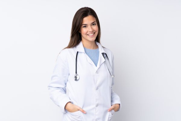Teenager,Girl,Over,Isolated,White,Background,Wearing,A,Doctor,Gown