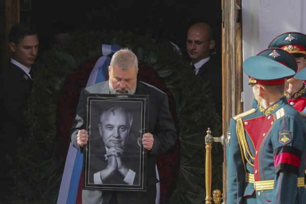 epa10156827 Nobel Peace Prize laureate journalist Dmitry Muratov carries a picture of late former Soviet president Mikhail Gorbachev after a farewell ceremony at the House of Trade Unions in Moscow, Russia, 03 September 2022. Former Soviet leader Mikhail Gorbachev died on 30 August 2022 at the age of 91 in Moscow Central Clinical Hospital. Gorbachev initiated numerous reforms during his tenure. He signed a nuclear arms treaty with the United States and withdrew the Soviet Union from the Soviet-Afghan war. His policies created freedom of speech and press, and decentralized fiscal policy planning and execution to increase efficiency. Gorbachev was the last leader of the Soviet Union, overseeing Russia transition from one party rule to a fragile democracy. Gorbachev will be buried at the Novodevichy Cemetery in Moscow next to the grave of his wife Raisa.  EPA/MAXIM SHIPENKOV