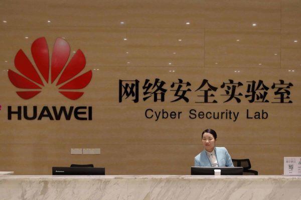 A receptionist stands at the front counter of the Huawei's Cyber Security Lab at the Huawei factory in Dongguan, China's Guangdong province, Wednesday, March 6, 2019. Huawei Technologies Co. is one of the world's biggest supplier of telecommunications equipment. (ANSA/AP Photo/Kin Cheung) [CopyrightNotice: Copyright 2018 The Associated Press. All rights reserved]