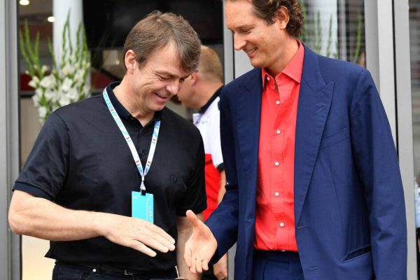 FCA group president John Elkann (R) shakes hand with FAC group Michael Manley, at paddock prior to the start of the Formula One Italy Grand Prix at the Monza racetrack, Italy,2 September 2018.ANSA/DANIEL DAL ZENNARO