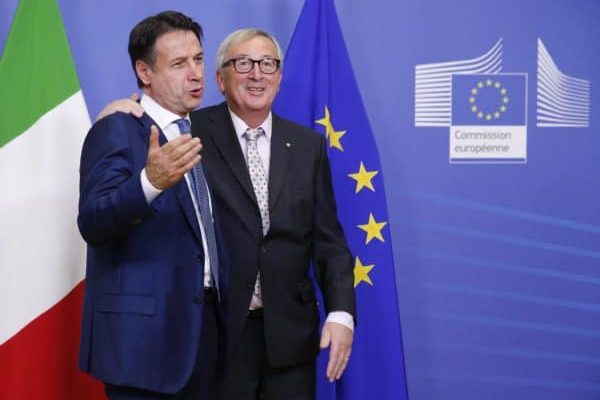 epa07187630 Italian Prime Minister Giuseppe Conte (L) is welcomed by EU Commission President Jean-Claude Juncker (R) prior to a meeting at the EU Commission headquarter in Brussels, 24 November 2018. The Italian Prime Minister and EU Commission president Juncker meet for a working dinner to discuss Italy's expansionary budget for 2019 which the EU had rejected in October. Conte will also attend a special meeting of the European Council on Britain leaving the EU under Article 50, also dubbed the 'Brexit', on 25 November.  EPA/JULIEN WARNAND