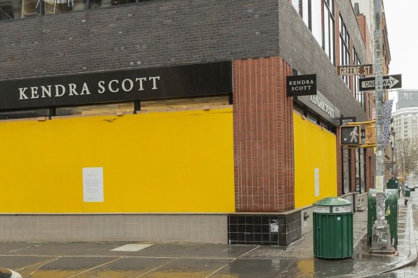 March 28, 2020, New York, New York, United States: Some high end stores like Kendra Scott on Greene Street boarding up with plywood windows and entrances to prevent looting in Manhattan  (Credit Image: © Lev Radin/Pacific Press via ZUMA Wire)