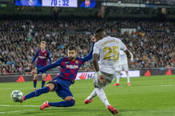 March 1, 2020, Madrid, Spain: Vinicius Jr of Real (R) in action during the Spanish La Liga match round 26 between Real Madrid and FC Barcelona at Santiago Bernabeu Stadium in Madrid..Final score: Real Madrid 2-0 Barcelona. (Credit Image: © Manu Reino/SOPA Images via ZUMA Wire)