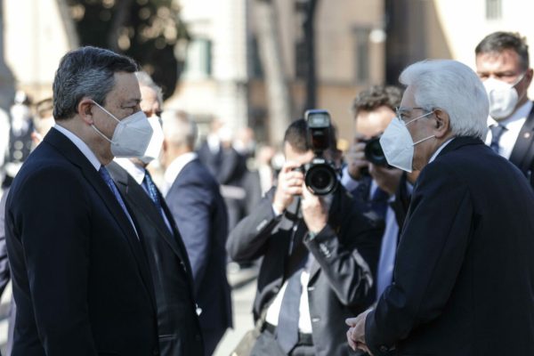 Italian Prime Minister Mario Draghi (L) and italian President Sergio Mattarella at the Tomb of the Unknown Soldier during celebration for the 76th Liberation Day, in Rome, Italy, 25 April 2021. ANSA/GIUSEPPE LAMI