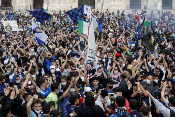 FC Inter's supporters celebrate in Piazza del Duomo the victory of the italian championship (Scudetto), Milan, Italy, 2 May 2021. Inter won the 19th title of his history and the first since 2009-2010 season. ANSA/Mourad Balti Touati