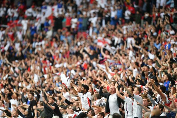 epa09311775 Fans of England celebrate after the UEFA EURO 2020 round of 16 soccer match between England and Germany in London, Britain, 29 June 2021.  EPA/Justin Tallis / POOL (RESTRICTIONS: For editorial news reporting purposes only. Images must appear as still images and must not emulate match action video footage. Photographs published in online publications shall have an interval of at least 20 seconds between the posting.)