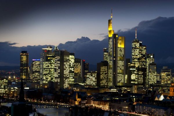 epa03027369 The evening skyline of Frankfurt, Germany, is dominated by the illuminated banking skyscrapers on 07 December 2011 evening. The results of a stress test of the European Banking Authority (EBA) on German and European banks is expected to be announced on 08 December 2011 in London.  EPA/BORIS ROESSLER