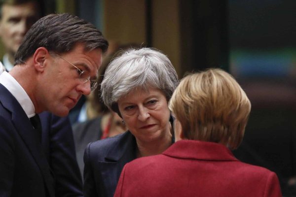 epa07228537 (L-R) Dutch Prime Minister Mark Rutte, Britain's Prime Minister Theresa May  and German Federal Chancellor Angela Merkel chat at the start of the European Council in Brussels, Belgium, 13 December 2018. During their two days summit, European leaders will focus on  the 'Brexit' and on the EU's budget for 2021until 2027. The Summit will resume on 14 December with the EU28 adoption of the conclusions on the Single Market, climate change, migration, disinformation, the fight against racism and xenophobia, and citizens' consultations.  EPA/OLIVIER HOSLET