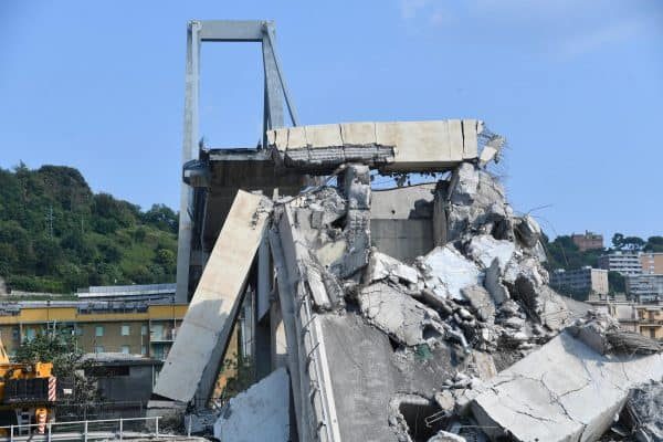 A general view showing a part of the partially collapsed Morandi bridge, in Genoa, Italy, 19 August 2018. Italian authorities, worried about the stability of remaining large sections of the bridge, evacuated about 630 people from nearby apartments. ANSA/LUCA ZENNARO