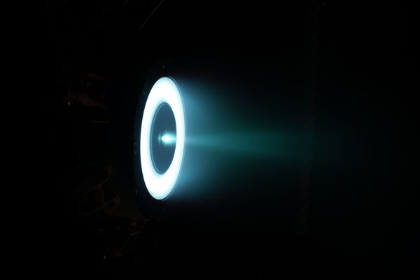 July 12, 2023, Cleveland, Ohio, United States: This image shows: A view from inside the vacuum chamber showing the Advanced Electric Propulsion System fired up during qualification testing at NASA Glenn...Engineers from NASA and Aerojet Rocketdyne are beginning qualification tests on revolutionary new solar electric propulsion (SEP) thrusters that will change the way space craft are propelled. .The culmination of this work will see these innovative thrusters fly on the Gateway lunar space station beginning in 2025, making it the most powerful SEP spacecraft ever flown. Gateway will serve as an important part of NASAâ€™s Artemis programme..Led by NASAâ€™s Technology Demonstration Missions program, the Advanced Electric Propulsion System (AEPS), built by Aerojet Rocketdyne, provides 12 kilowatts of propulsive power â€“ over two times more powerful than current state-of-the-art in-space electric propulsion systems. These innovative systems tout extremely high fuel economy at lower thrust, providing mission flexibility and capabilities not achievable using traditional chemical propulsion systems. Three AEPS thrusters will be used on the Power and Propulsion Element (PPE) to maneuver Gateway during its planned minimum 15-year mission..â€œAEPS is truly a next-generation technology,â€ said Clayton Kachele, the AEPS project manager at NASAâ€™s Glenn Research Center in Cleveland. â€œCurrent electric propulsion systems use around four and a half kilowatts of power, whereas here weâ€™re significantly increasing power in a single thruster. That capability opens a world of opportunity for future space exploration, and AEPS will get us there farther and faster.â€.The AEPS must undergo qualification testing before being certified to fly on Gateway. The combined NASA-Aerojet team will use two qualification units â€“ models nearly identical to the thrusters that will fly on PPE â€“ during these tests..In early July,  (Credit Image