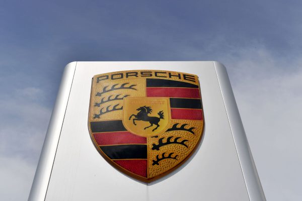 PORSCHE brand emblem at a car dealership, car dealer, contracted label logo, car make. Car maker, logo, emblem, | usage worldwide