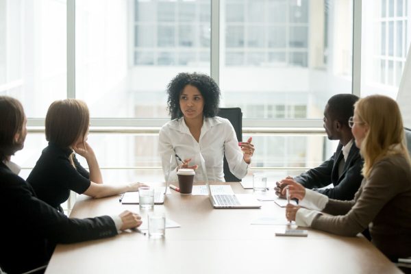 Black,Female,Boss,Leading,Corporate,Multiracial,Team,Meeting,Talking,To