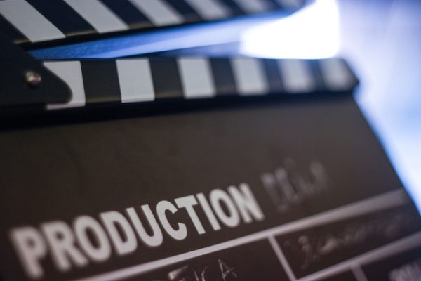 Clapperboard,Whit,Soft,Focus,And,Blue,Background