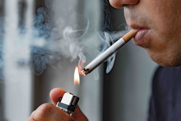 Close,Up,Young,Man,Smoking,A,Cigarette.